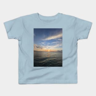 Sunset over the ocean Kids T-Shirt